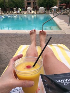 A mango daiquiri and spring fashion mag make for great companion